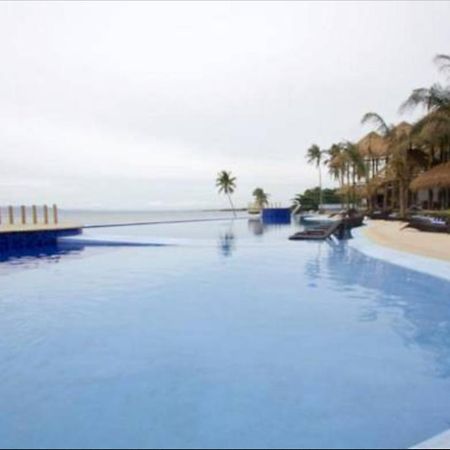 The Bellevue Resort Panglao Bagian luar foto Infinity pool at the Iberostar Grand Hotel, Playa del Carmen, Mexico